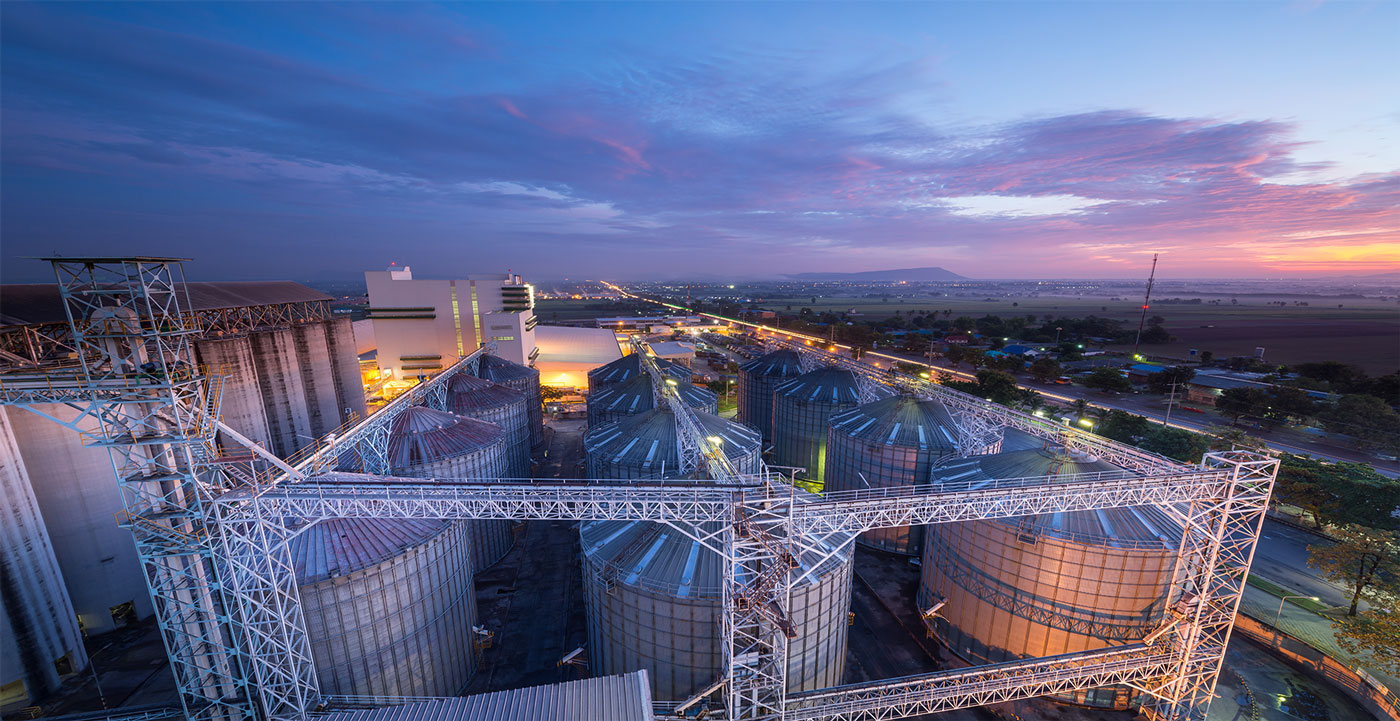 Grain Bins Dusk Dawn Bg | Grain Systems Distribution